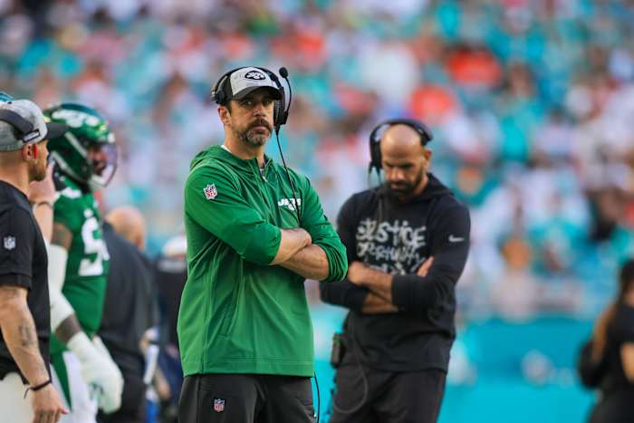 Dec 17, 2023; Miami Gardens, Florida, USA; New York Jets quarterback Aaron Rodgers (8) looks on from the sideline against the Miami Dolphins during the fourth quarter at Hard Rock Stadium.